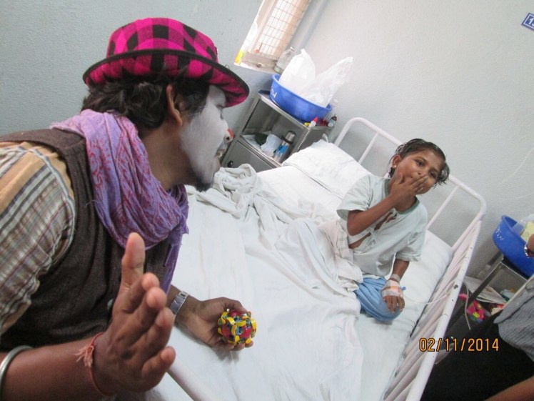 Harish with a kid in hospital
